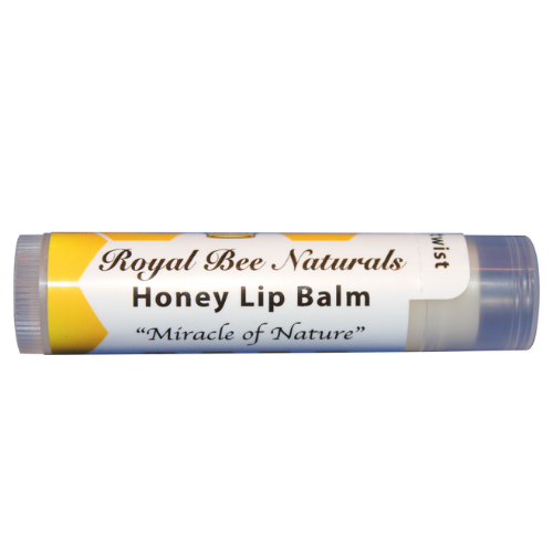 picture of our lip balm, white with a yellow honeycomb pattern